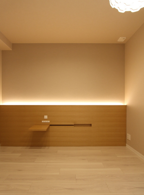 岡山市内の新築マンションのリノベーション工事、完成したピンクベージュの寝室